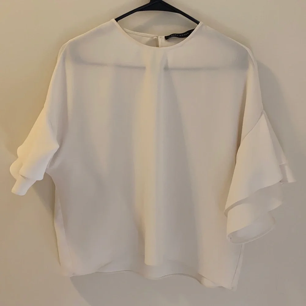 - Zara white puff sleeve blouse